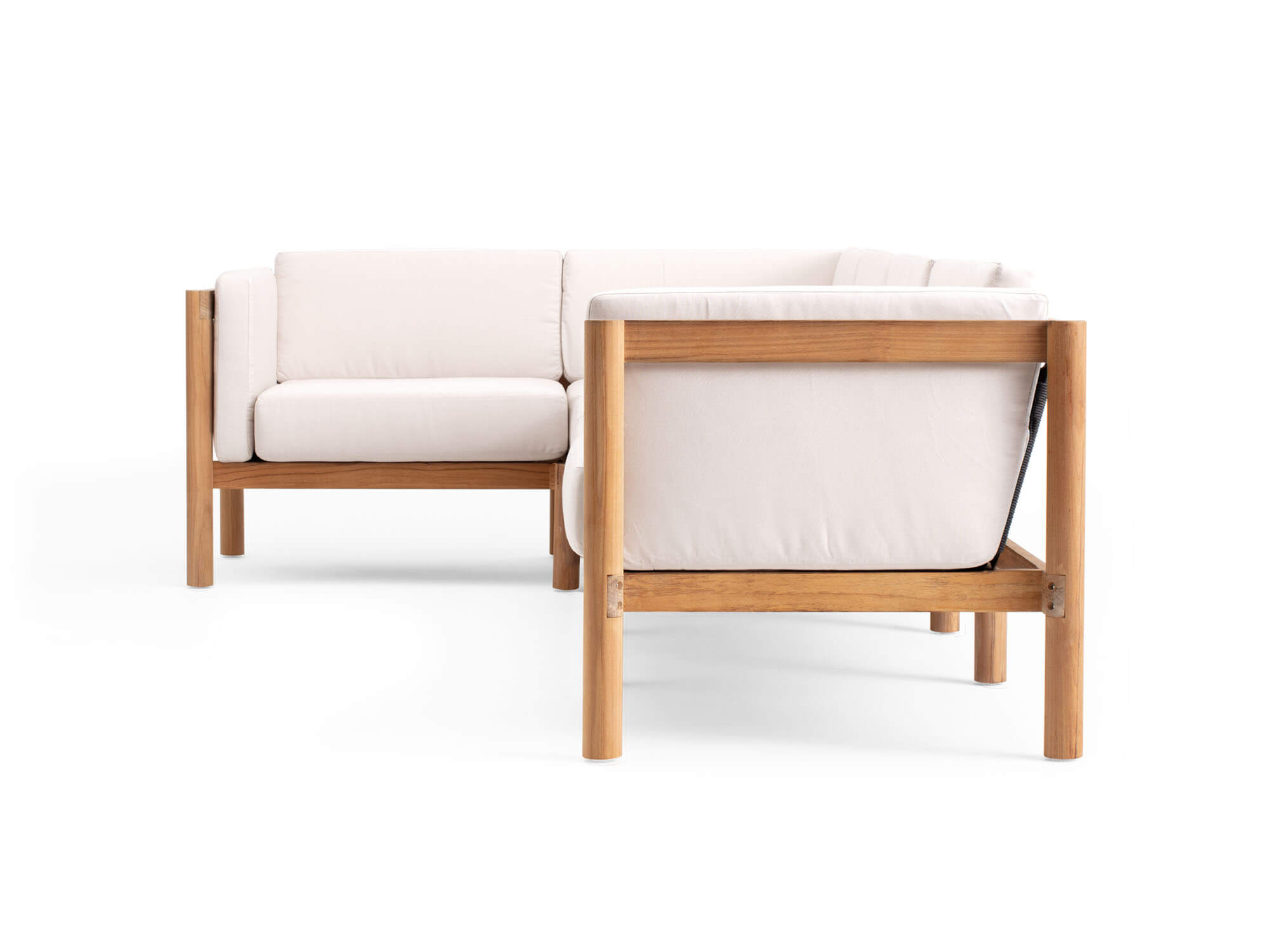 Side view of 4-piece outdoor sectional with white arm cushions